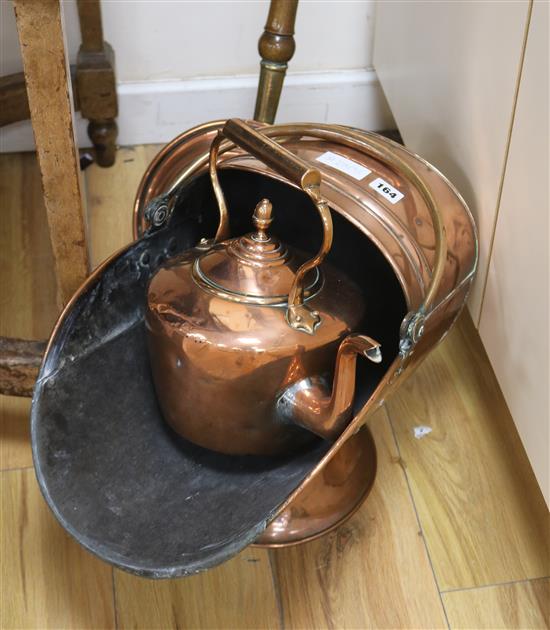 A Victorian copper coal scuttle, a long-handled warming pan and a kettle